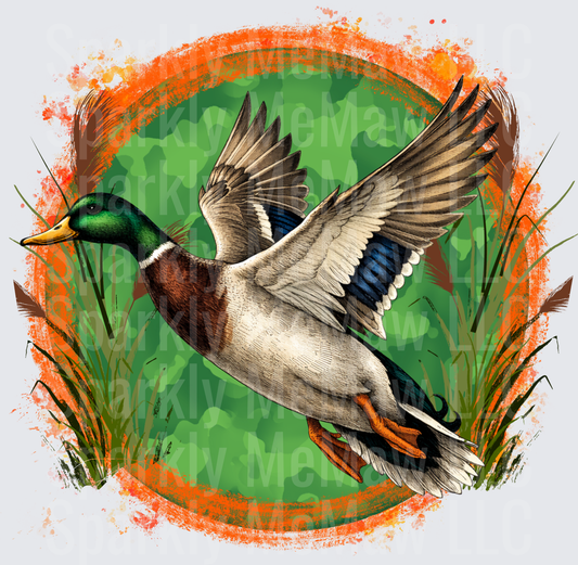 Flying Mallard Duck in Wetland Cattails with Orange Splash Border UV DTF Decal